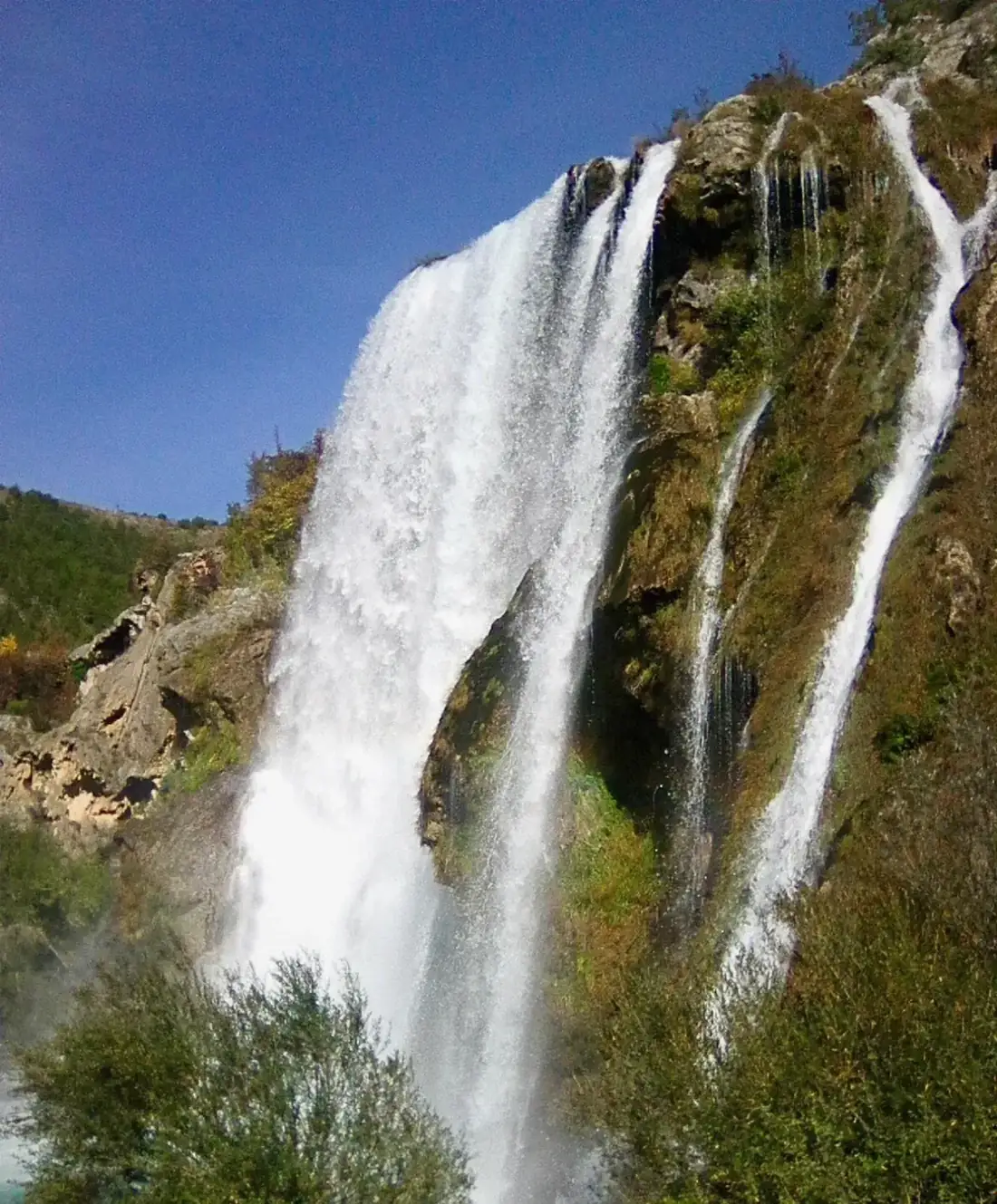 Krcic falls, the source waterfall where the Krka river rises from the karst field in Croatia